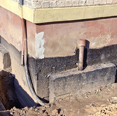 repair old urban house foundation